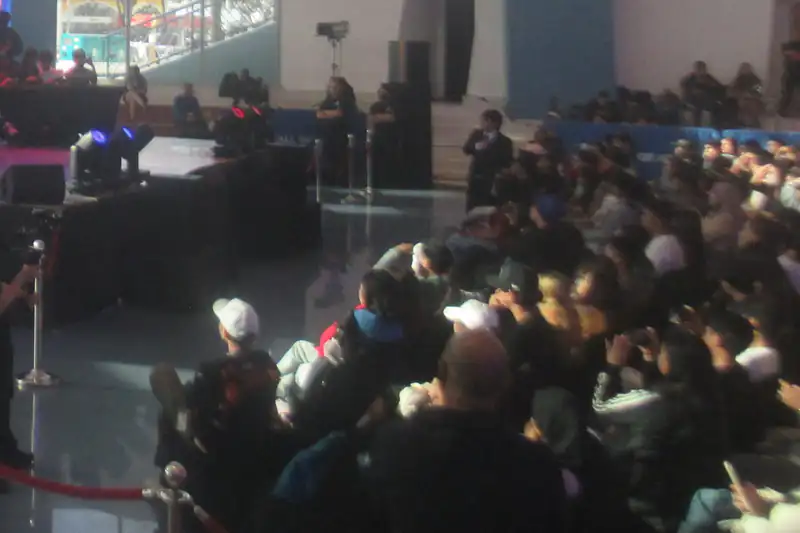 Large audience watching a Mobile Legends tournament stage at SM MOA Music Hall in Pasay